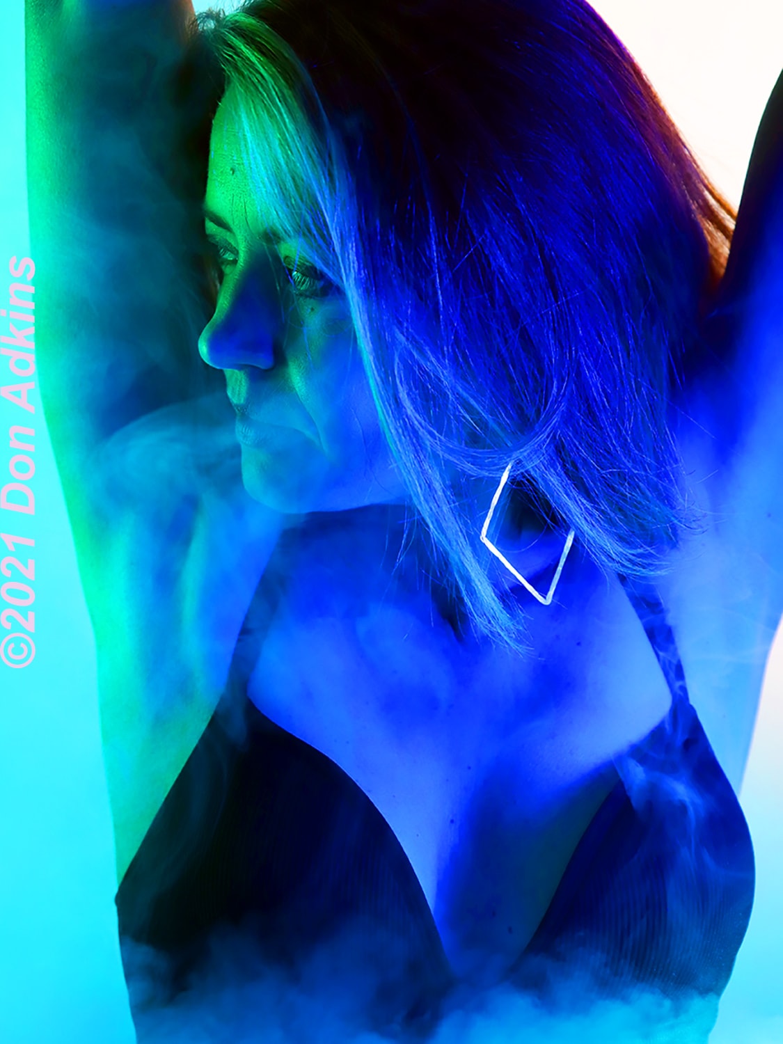 Blue smoke fine art profile portrait with diamond earring