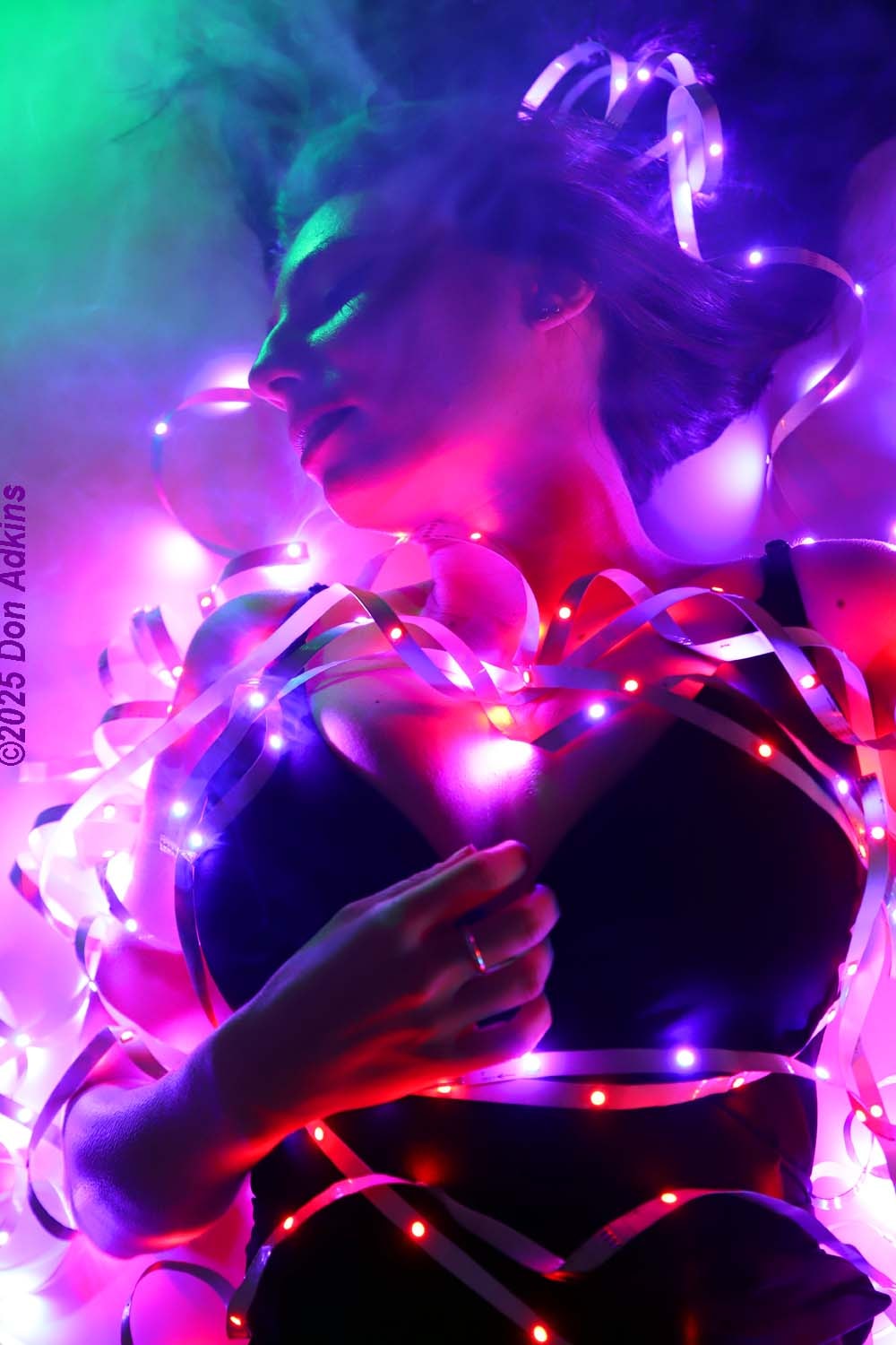 Fine art portrait with magenta and purple LED strips and smoke — Katie